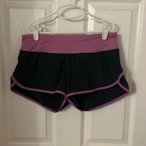 Lulu lemon 2.5 running shorts, gray with purple accents, size 4